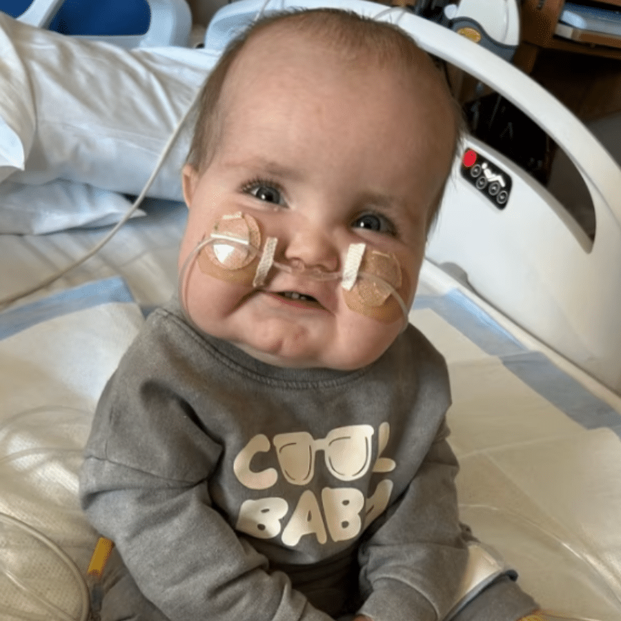 Emmett smiling in his hospital bed