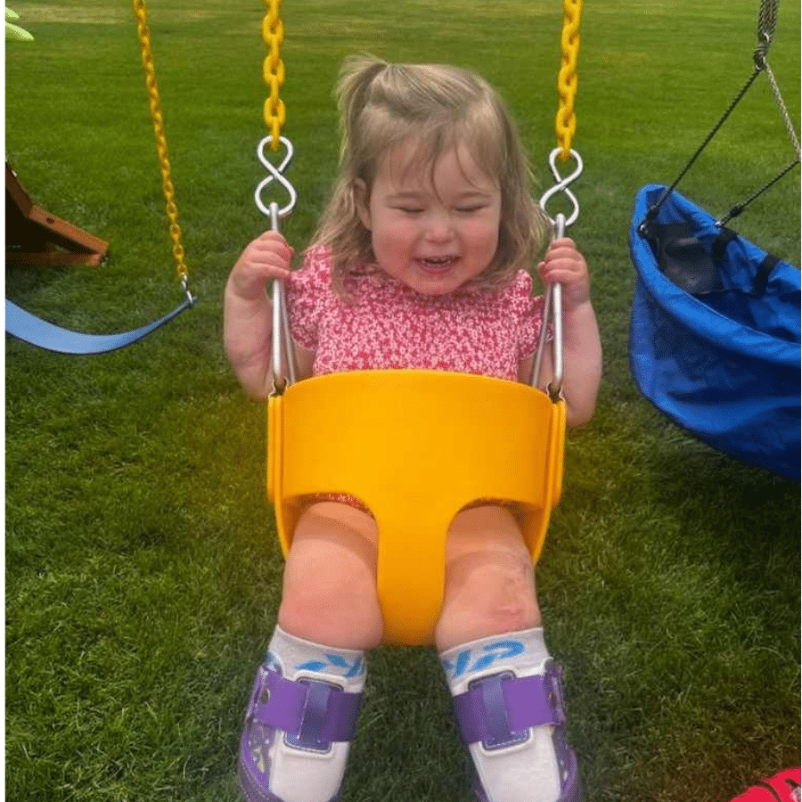 Kinsley swinging & smiling