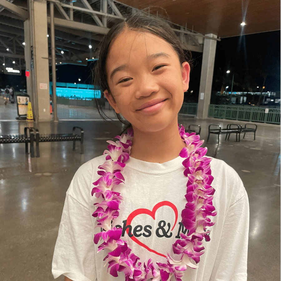 Lucy with a lei in Hawaii