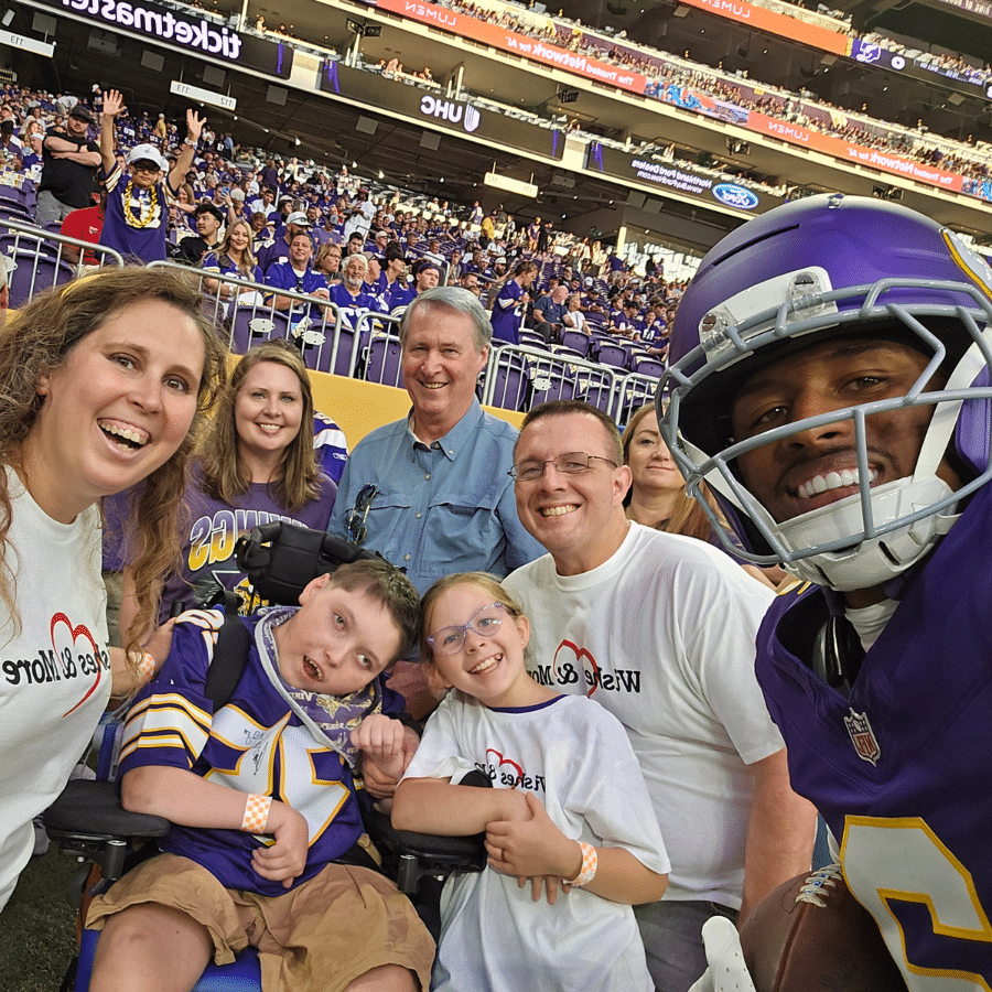 Peter and his family with the MN Vikings