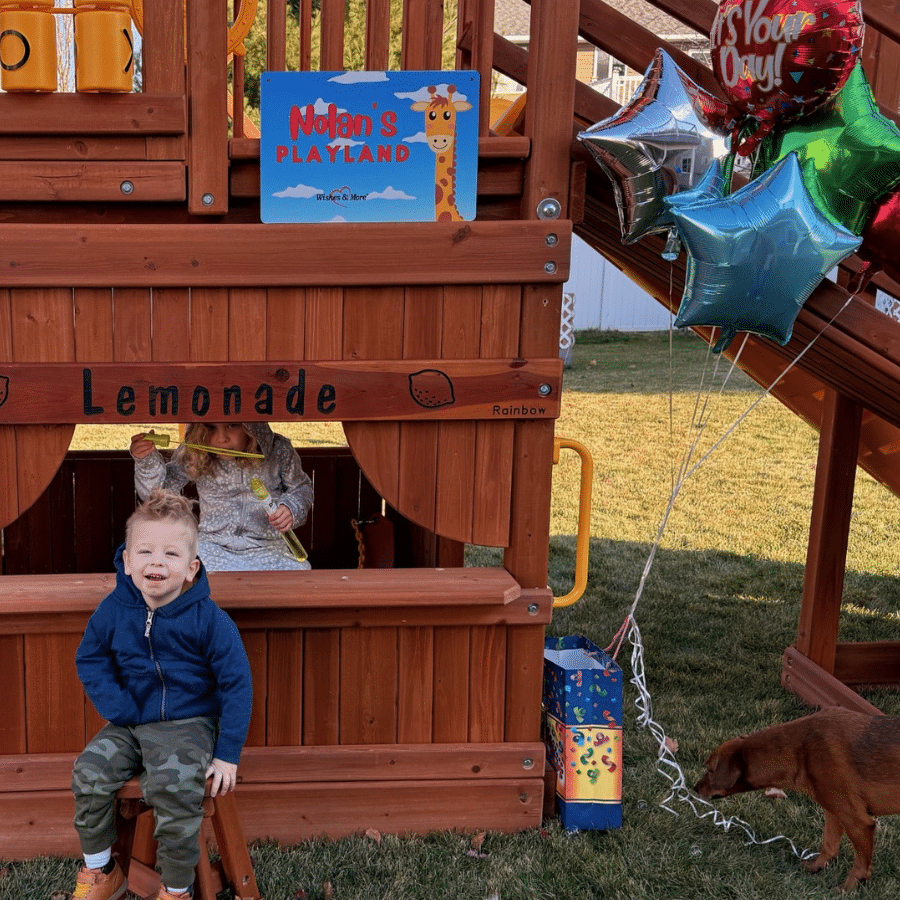Nolan with his playset on his wish reveal day
