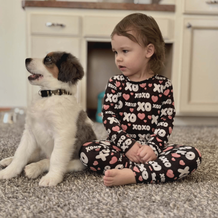 Kinsley with her new Bernadoodle Puppy