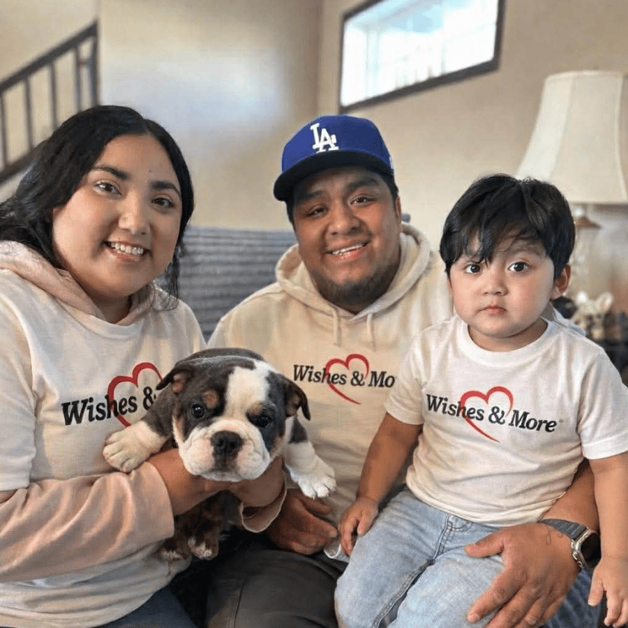 Izael with his parents and his new puppy