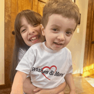 Alex with his big sister on his wish trip to Duluth