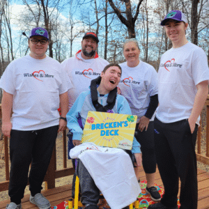 Brecken with his family on his new deck