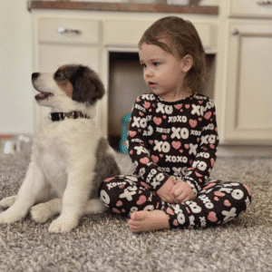 Kinsley with her new Bernadoodle Puppy
