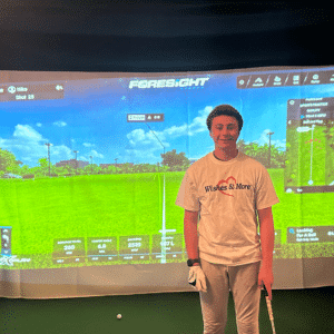 Niko with his golf simulator