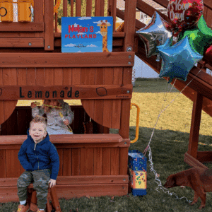 Nolan with his playset on his wish reveal day