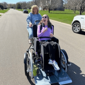 Olivia's first ride on her new custom-built bike
